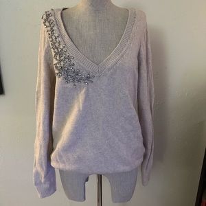 Gently used sweater only worn a couple of times.